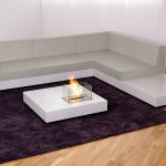 Lounge und Couchtisch mit Feuerstelle aus Beton